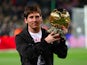 Barcelona's Lionel Messi poses with the men's Ballon d'Or trophy on December 16, 2009 Barcelona's Lionel Messi poses with the men's Ballon d'Or trophy on December 16, 2009